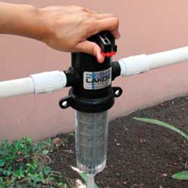 Sprinkler head watering grass